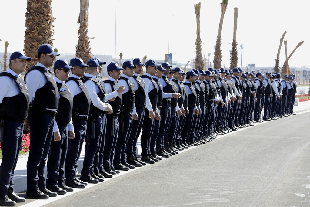 Police officers are seen in front of the International Convention Center as the UN climate summit COP27 is being held in Sharm el-Sheikh, Egypt on November 12, 2022. (Photo by Mohamed Abdel Hamid/Anadolu Agency via Getty Images)
