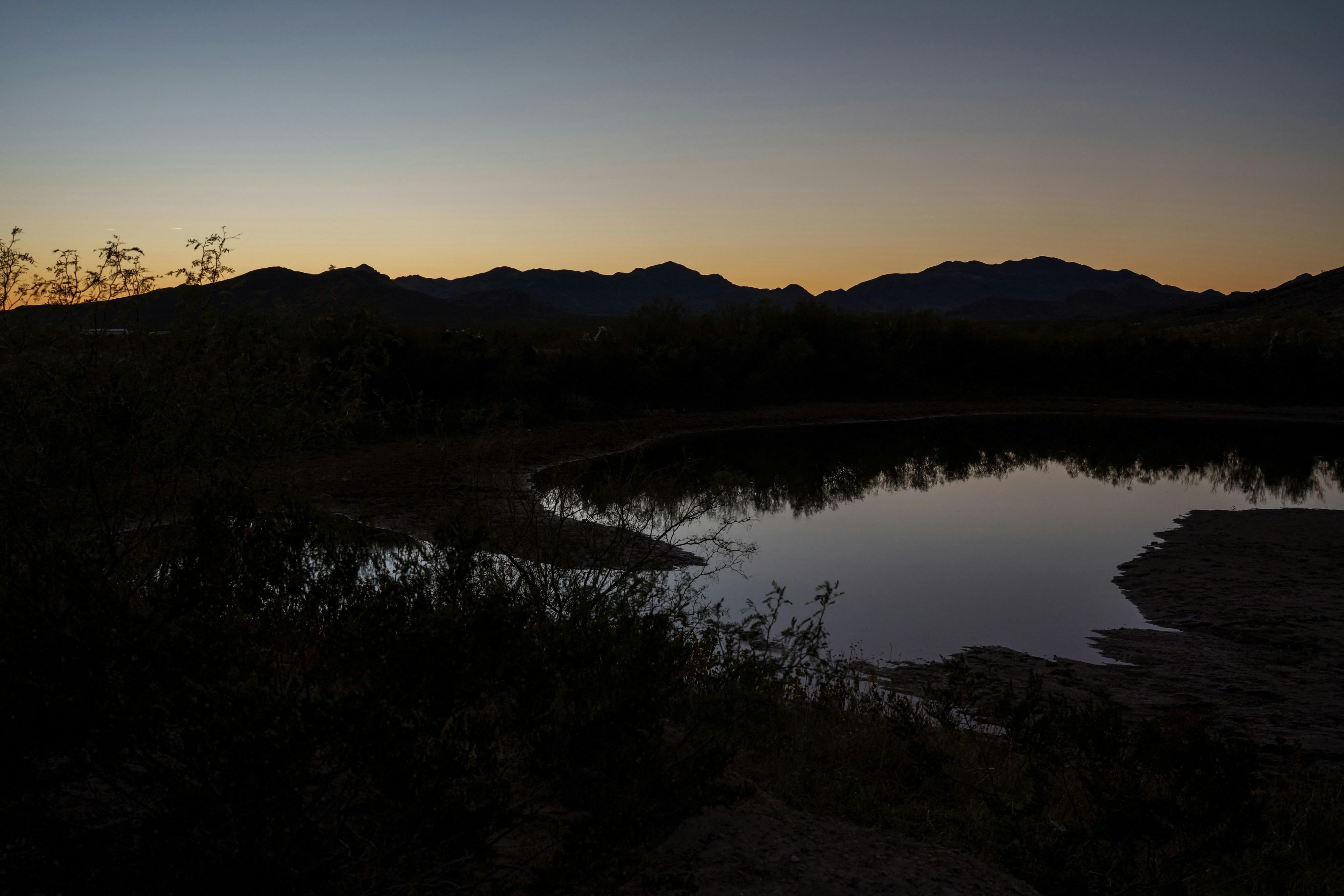 A view of the Five Mile Tank after sunset where a group of migrants were shot at by Michael and Mark Sheppard in late September, near Sierra Blanca, Texas on Sunday November 6, 2022. Photo: Paul Ratje for The Intercept