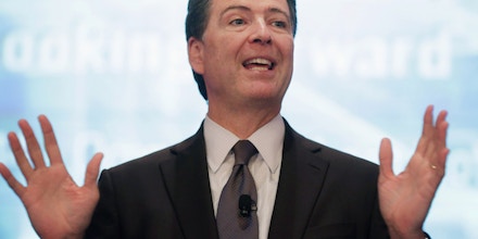 WASHINGTON, DC - SEPTEMBER 19:  Federal Bureau of Investigation Director James Comey addresses the Intelligence and National Security Summit at the Omni Shoreham Hotel September 19, 2014 in Washington, DC. After one year on the job, Comey outlined his vision for the future of the FBI, including a bigger focus on cyber and the creation of a new intelligence office within the bureau.  (Photo by Chip Somodevilla/Getty Images)