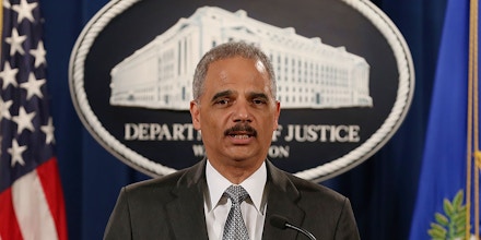 WASHINGTON, DC - DECEMBER 03:  U.S. Attorney General Eric Holder speaks at the Justice Department December 3, 2014 in Washington, DC. Holder spoke about the recent decision by a Staten Island grand jury not to indict a police officer in the chokehold death of Eric Garner.  (Photo by Mark Wilson/Getty Images)