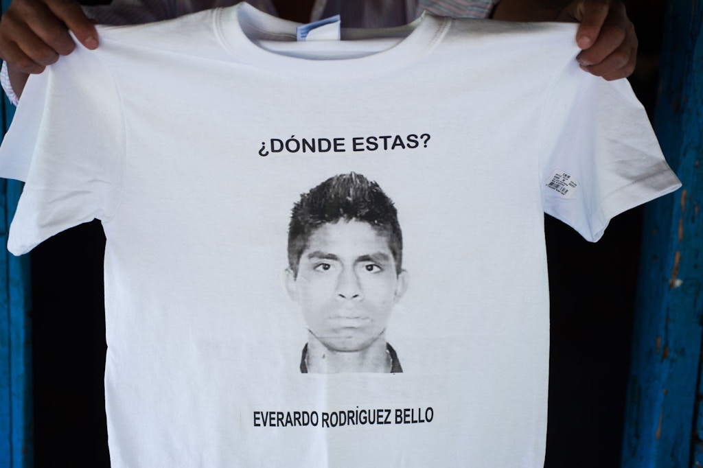 Forty-three male students from the Raul Burgos Rural Teachers College in Ayotzinapa, Guerrero were disappeared on September 26, 2014 at the hands of local police working in conjunction with drug traffickers. A t-shirt imprinted with his photo asks 'Where are you, Everardo Rodríguez Bello?'.