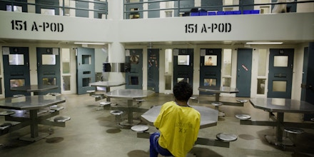 An inmate with mental health conditions is handcuffed to a table while jailed in the Medium Observation Housing at the Los Angeles County Sheriffs Department Twin Towers Correctional Facility in Los Angeles, California, U.S., on Tuesday, Sept. 23, 2014. Conditions for mentally ill inmates in Los Angeles county have been a focus of federal probes since 1997, and the number with psychiatric disorders was an issue in a recent debate over a new jail. Photographer: Patrick T. Fallon/Bloomberg via Getty Images