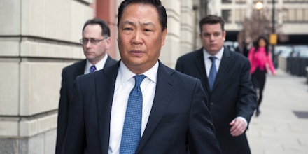 Stephen Kim, a former State Department expert on North Korea, leaves federal court in Washington, Wednesday, April 2, 2014, after a federal judge sentenced him to 13 months in prison for passing classified information to a journalist.  (AP Photo/Cliff Owen)