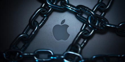 Illustrative photographs of locks, chains, iPhones, and Apple computers to illustrate the theme of 