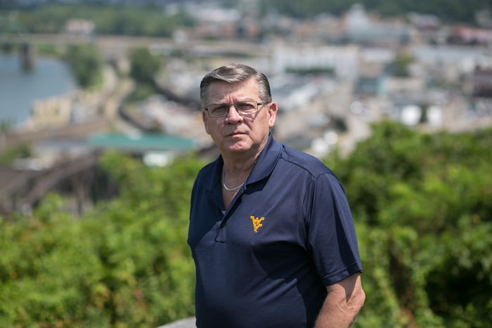 Joe Kiger stands at Fort Boreman Park in Parkersburg, WV on Wednesday, August 5, 2015.  Kiger brought a letter from Lubeck Public District, the company that provides his drinking water, to a lawyer who realized then that the entire water district had been contaminated and filed a class action lawsuit.