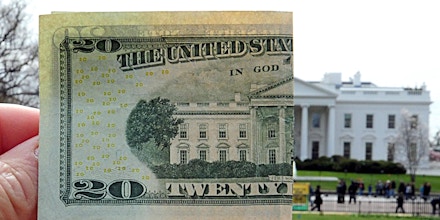 This March 25, 2009 photo illustration shows the reverse side of a US twenty dollar bill matched up with the north side of the White House in Washington, DC. US Treasury Secretary Timothy Geithner defended the dollar as a key global reserve currency on March 25, following China's call for a new global currency as an alternative to the greenback.  AFP PHOTO/KAREN BLEIER (Photo credit should read KAREN BLEIER/AFP/Getty Images)