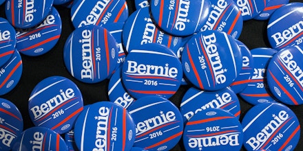 DES MOINES, IA - JUNE 12:  Buttons sit on a table during a campaign event for Senator Bernie Sanders (D-VT) at Drake University on June 12, 2015 in Des Moines, Iowa. Sanders, an advocate of providing free college education to all Americans, was greeted by a standing-room-only crowd at the event.  (Photo by Scott Olson/Getty Images)