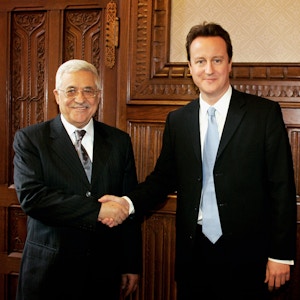 LONDON - FEBRUARY 22:  Leader of the Conservative Party, David Cameron shakes hands with Palestinian President Mahmoud Abbas in the shadow cabinet rooms of the Houses of Parliament on February 22, 2007 in London.  Abbas has already met witrh British Prime Minister Tony Blair for discussions over the progress of the NUG (national unity government). (Photo by Bruno Vincent/Getty Images) *** Local Caption *** David Cameron; Mahmoud Abbas