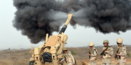 Saudi army artillery fire shells towards Yemen from a post close to the Saudi-Yemeni border, in southwestern Saudi Arabia, on April 13, 2015 . Saudi Arabia is leading a coalition of several Arab countries which since March 26 has carried out air strikes against the Shiite Huthis rebels, who overran the capital Sanaa in September and have expanded to other parts of Yemen. AFP PHOTO / FAYEZ NURELDINE        (Photo credit should read FAYEZ NURELDINE/AFP/Getty Images)