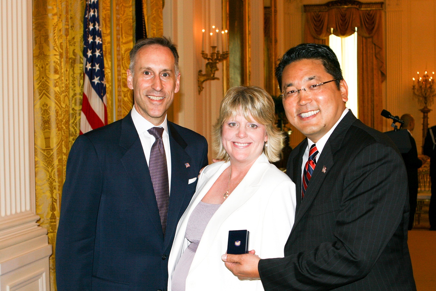 Jack Hawkins, Director of Volunteers for Prosperity (USAID) at the White House celebration of Asian Pacific Heritage Month.Kay Hiramine of Colorado Springs, Colo., recipient of the President's Volunteer Service award and Volunteers for Prosperity participant.