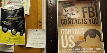 Flyers are posted on a wall outside of the prayer room at the Islamic Culture Center in Newark, N.J., Wednesday, Feb. 15, 2012. Newark’s mayor is promising an investigation after learning that the New York Police Department spied on his city and built secret files on mosques and Muslim businesses. For months in mid-2007, plainclothes NYPD officers fanned out across Newark, taking pictures and eavesdropping on conversations in Muslim communities. The result was a 60-page guide to the city’s Muslims. It was obtained by The Associated Press. (AP Photo/Charles Dharapak)