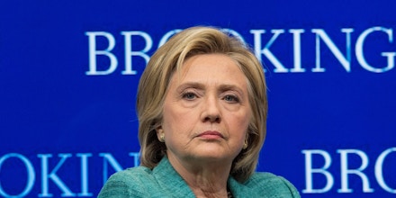 US Democratic presidential candidate Hillary Clinton takes part in a discussion after speaking about the Iran nuclear deal at the Brookings Institution in Washington, DC, on September 9, 2015. Clinton expressed firm support for the nuclear accord with Iran, calling it flawed but still strong. Clinton added that the agreement must be strictly enforced and said that if elected president next year, she would not hesitate to use military force if Iran fails to live up to its word and tries to develop a bomb.   AFP PHOTO/NICHOLAS KAMM        (Photo credit should read NICHOLAS KAMM/AFP/Getty Images)