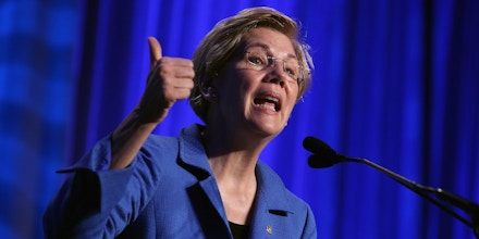 WASHINGTON, DC - JULY 16:  U.S. Sen. Elizabeth Warren (D-MA) addresses the 10th annual Make Progress National Summit at the Walter E. Washington Convention Center July 16, 2015 in Washington, DC.  Hundreds of youth leaders, student activists, and organizers gather for the convention which is organized by Generation Progress, the youth engagement arm of the liberal think tank Center for American Progress.  (Photo by Chip Somodevilla/Getty Images)
