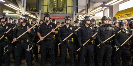 MINNEAPOLIS, MN -  DECEMBER 23:  Police queue up at the Minneapolis-St. Paul International airport Lightrail stop, where a number of Black Lives Matter protestors attempted to enter the airport on December 23, 2015 in Minneapolis, Minnesota. Black Lives Matter Minneapolis staged a brief protest at the Mall of America in Bloomington, MN before moving their protest to the airport. (Photo by Stephen Maturen/Getty Images))