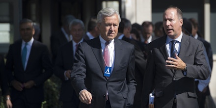 John Stumpf (L), Chairman, President, and CEO of Wells Fargo; and Rob Nichols, President and CEO of the Financial Services Forum, arrive for a meeting of the Financial Services Forum with US President Barack Obama at the White House in Washington, DC, October 2, 2013, on the second day of the government shutdown. AFP PHOTO / Saul LOEB        (Photo credit should read SAUL LOEB/AFP/Getty Images)