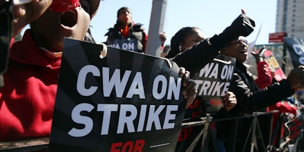 NEW YORK, NEW YORK - APRIL 13:  Hundreds of Verizon workers strike outside of the telecommunications company's Brooklyn offices on April 13, 2016 in New York City. Across the nation nearly 40,000 Verizon workers with the Communications Workers of America (CWA) and the International Brotherhood of Electrical Workers (IBEW) walked off their jobs Wednesday demanding a new contract. The workers' contract expired in August, and Verizon management has yet to negotiate a new one citing issues with health care expenses for its retired and current employees.  (Photo by Spencer Platt/Getty Images)