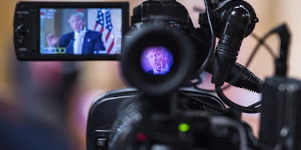 HANAHAN, SC - FEBRUARY 15: Republican presidential candidate Donald Trump is seen speaking through a camera at a press conference at the City of Hanahan town hall in Hanahan, SC on Monday Feb. 15, 2016. (Photo by Jabin Botsford/The Washington Post via Getty Images)