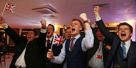 Leave.EU supporters wave Union flags and cheer as the results come in at the Leave.EU referendum party at Millbank Tower in central London early in the morning of June 24, 2016.First results from Britain's knife-edge referendum showed unexpectedly strong support for leaving the European Union on Friday, sending the pound plummeting as investors feared a historic blow against the 28-nation alliance. / AFP / GEOFF CADDICK (Photo credit should read GEOFF CADDICK/AFP/Getty Images)