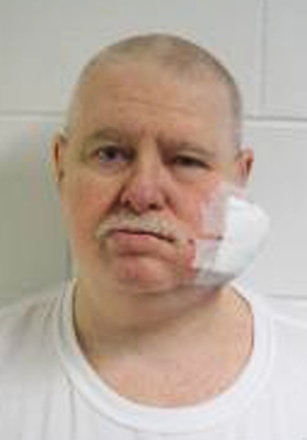 This undated photo provided by the Nebraska Department of Correctional Services shows Michael Ryan. Ryan, who had spent three decades on Nebraska's death row for the 1985 cult killings of two people, including a 5-year-old boy, has died in prison, officials said Monday, May 25, 2015. (Nebraska Department of Correctional Services via AP)