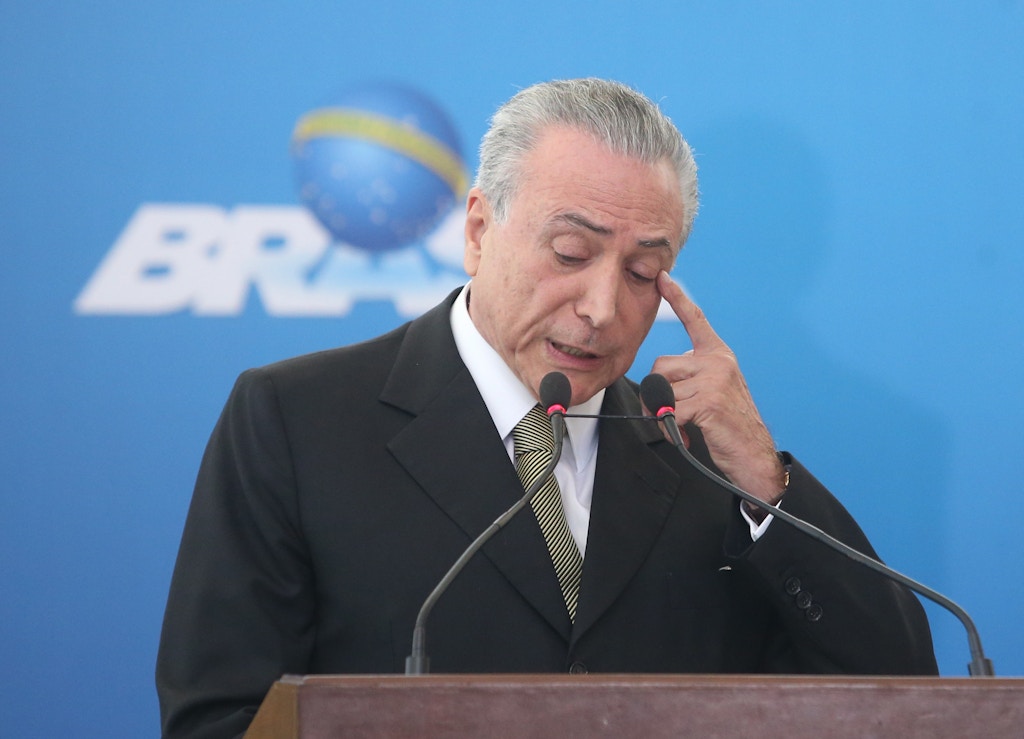 The incumbent president, Michel Temer, during inauguration ceremony of the presidents of public banks and Petrobras, in Planalto Palace, in Brasilia, capital of Brazil, on 1 June 2016. Fearing used the event to take stock of the first days of his interim government and highlight the "scenario" in which he found the country after the departure of President Dilma Rousseff. Photo: ANDRE DUSEK/ESTADAO CONTEUDO (Agencia Estado via AP Images)