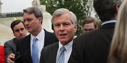 WASHINGTON, DC - APRIL 27:  Former Virginia Governor Robert McDonnell, followed by members of the media, leaves the U.S. Supreme Court April 27, 2016 in Washington, DC. The Supreme Court heard the corruption appeal from McDonnell, who and his wife were convicted of accepting more than $175,000 of gifts and favors from businessman Jonnie Williams, who wanted their help to promote his dietary supplement product called Anatabloc.  (Photo by Alex Wong/Getty Images)