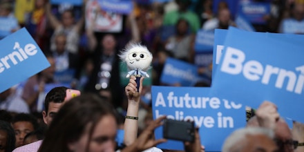 PHILADELPHIA, PA - JULY 25:  Supporters of Sen. Bernie Sanders (I-VT) stand and cheer as he delivers remarks on the first day of the Democratic National Convention at the Wells Fargo Center, July 25, 2016 in Philadelphia, Pennsylvania. An estimated 50,000 people are expected in Philadelphia, including hundreds of protesters and members of the media. The four-day Democratic National Convention kicked off July 25.  (Photo by Chip Somodevilla/Getty Images)