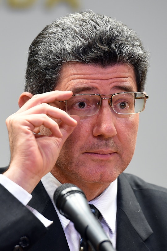 Brazilian Minister of Economy Joaquim Levy gestures during press conference at the Economy Ministry in Brasilia, on September 10, 2015. Standard & Poor's financial services company downgraded Brazil, stripping the country of its investment-grade status and leaving President Dilma Rousseff's government on life support, risking an investor rush for the exits, analysts said Thursday. AFP PHOTO/EVARISTO SA        (Photo credit should read EVARISTO SA/AFP/Getty Images)
