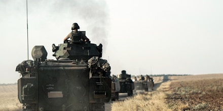 Turkish troops head to the Syrian border, in Karkamis, Turkey, Saturday, Aug. 27, 2016. Turkey on Wednesday sent tanks across the border to help Syrian rebels retake the key Islamic State-held town of Jarablus and to contain the expansion of Syria's Kurds in an area bordering Turkey .(AP Photo/Halit Onur Sandal)