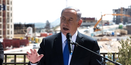 Israeli Prime Minister and Likud party's candidate running for general elections, Benjamin Netanyahu gives a statement to the press during his visit in Har Homa, an Israeli settlement neighbourhood of annexed east Jerusalem, on March 16, 2015 on the eve of Israels general elections. AFP PHOTO / MENAHEM KAHANA        (Photo credit should read MENAHEM KAHANA/AFP/Getty Images)