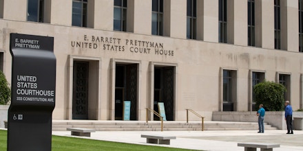 A view of the E. Barrett Prettyman Federal Courthouse that houses the U.S. Court of Appeals for the D.C. Circuit, on Tuesday, July 22, 2014, in Washington. Obama's health care law is enmeshed in another big legal battle after two federal appeals courts issued contradictory rulings on a key financing issue within hours of each other Tuesday.   (AP Photo/ Evan Vucci)