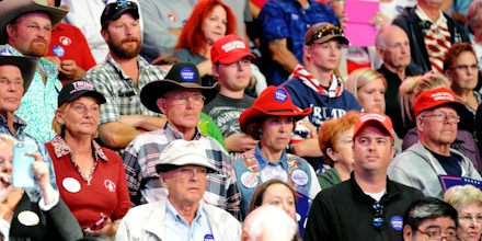 Supporters of Republican presidential nominee Donald Trump listen during his campaign stop at the Budweiser Events Center in Loveland, Colorado on October 3, 2016.  / AFP / Jason Connolly        (Photo credit should read JASON CONNOLLY/AFP/Getty Images)