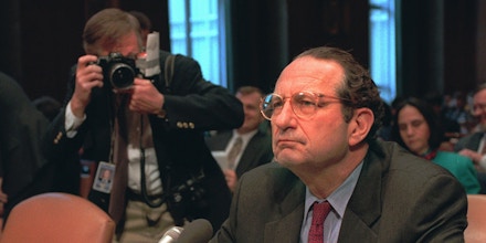 A photographer closes in on CIA Director John Deutch on Capitol Hill Thursday Feb. 22, 1996 prior to a hearing of the Senate Intelligence Committee. Deutch refused to rule out using U.S. journalists as spies when American lives are at stake or there is an imminent threat of the use of weapons of mass destruction. (AP Photo/Dennis Cook)