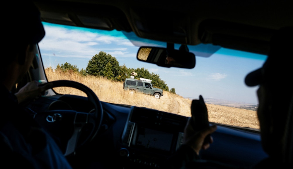 A Dutch and Bulgarian Border police officer ride a vehicle during a patrol near the border preventing illegal crossings by migrants at the Bulgarian-Turkish border near the Bulgarian village of Kapitan Andreevo, on October 7, 2016.   The EU launches its beefed-up border force in a rare show of unity by the squabbling bloc as it seeks to tackle its worst migration crisis since World War II. European Union officials inaugurate the new task force at the Kapitan Andreevo checkpoint on the Bulgarian-Turkish border, the main land frontier for migrants seeking to enter the bloc and avoid the dangerous Mediterranean sea crossing.  / AFP / DIMITAR DILKOFF        (Photo credit should read DIMITAR DILKOFF/AFP/Getty Images)