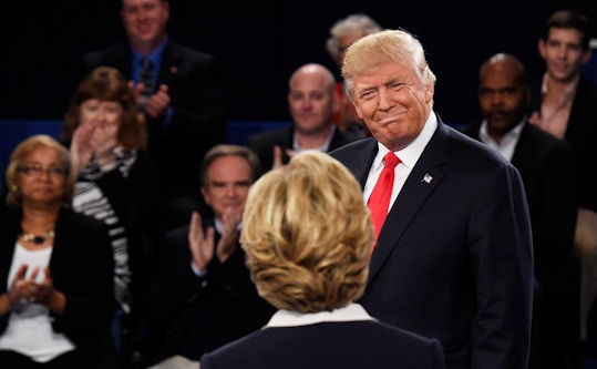 ST LOUIS, MO - OCTOBER 09:  Republican presidential nominee Donald Trump looks at Democratic presidential nominee former Secretary of State Hillary Clinton during the town hall debate at Washington University on October 9, 2016 in St Louis, Missouri. This is the second of three presidential debates scheduled prior to the November 8th election.  (Photo by Saul Loeb-Pool/Getty Images)