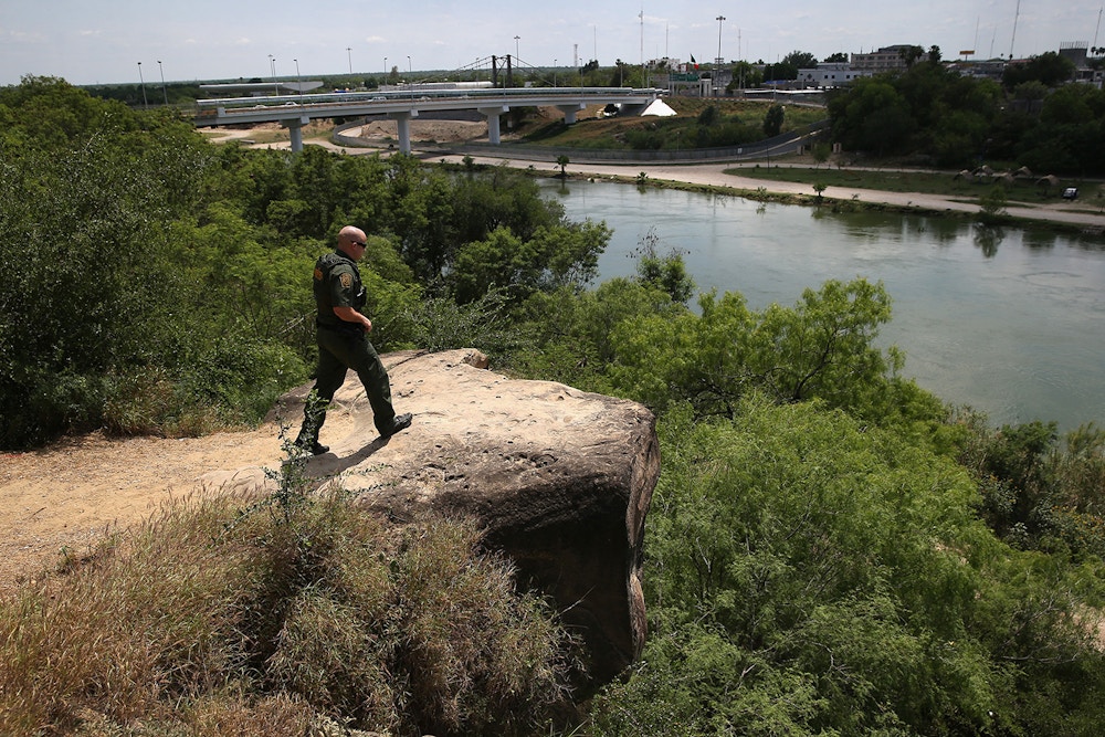 ROMA, TX - APRIL 14:  A Border Patrol agent scans for immigrants illegally crossing the Rio Grand into the United States on April 14, 2016 in Roma, Texas. Border security and immigration, both legal and otherwise, continue to be contentious national issues in the 2016 Presidential campaign.  (Photo by John Moore/Getty Images)