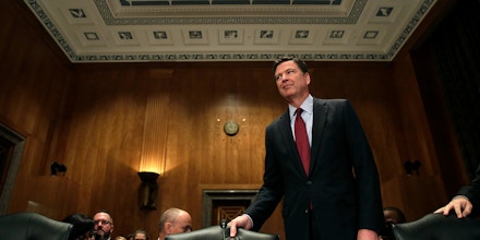 FBI Director James Comey arrives at a Senate Committee on Homeland Security and Government Affairs hearing on 