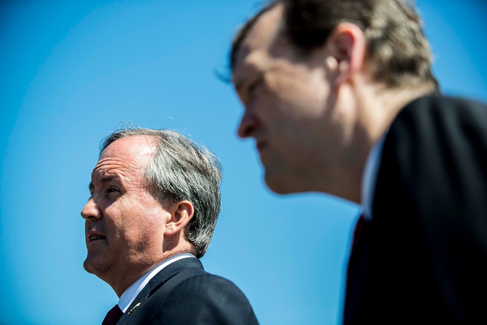 WASHINGTON, DC - JUNE 9:  Texas Attorney General Ken Paxton speaks to reporters at a news conference outside the Supreme Court on Capitol Hill on June 9, 2016 in Washington, D.C. Paxton announced a lawsuit against the state of Delaware over unclaimed checks.  (Photo by Gabriella Demczuk/Getty Images)