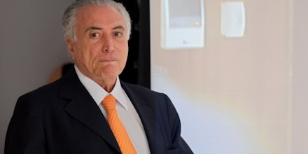 Brazilian President Michel Temer arrives to the presentation of the Investment Partnerships Program at Planalto Palace in Brasilia, on September 13, 2016. The government announced the concession or sale of 30 projects in the areas of energy, airports, roads, ports, railways and mining. According to the president, the package aims to increase investments to reflate the economy in recession and stimulate job creation. / AFP / EVARISTO SA (Photo credit should read EVARISTO SA/AFP/Getty Images)