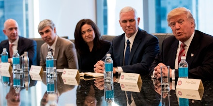NEW YORK, NY - DECEMBER 14: (L to R) Jeff Bezos, chief executive officer of Amazon, Larry Page, chief executive officer of Alphabet Inc. (parent company of Google), Sheryl Sandberg, chief operating officer of Facebook, Vice President-elect Mike Pence listen as President-elect Donald Trump speaks during a meeting of technology executives at Trump Tower, December 14, 2016 in New York City. This is the first major meeting between President-elect Trump and technology industry leaders. (Photo by Drew Angerer/Getty Images)
Restrictions