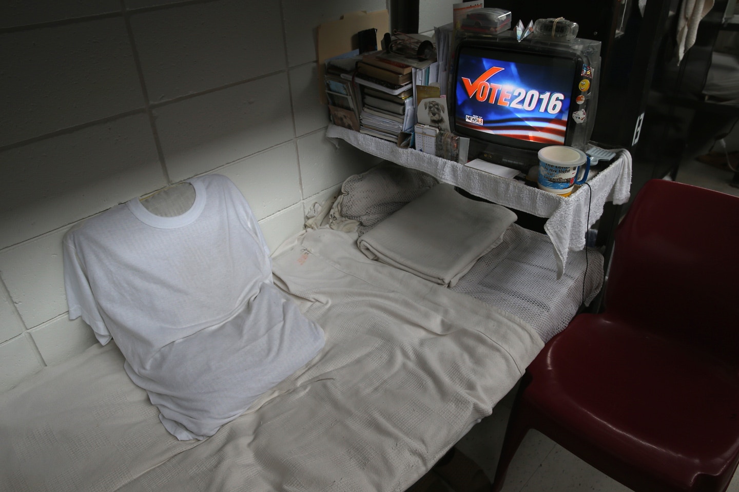 ENFIELD, CT - MAY 03:  Television news features Donald Trump over a prisoner's bunk at the Veterans Unit of the Cybulski Rehabilitation Center on May 3, 2016 in Enfield, Connecticut. Connecticut is one of only four states where voting rights are restored to convicted criminals immediately upon completion of their prison and parole time. The Veterans Unit houses some 110 inmates, all U.S. military veterans convicted of crimes ranging from petty larceny to murder. Prisoners at the unit typically have less than two years left on their sentences. The unit is part of a Connecticut Department of Correction program to turn some prisons into reintegration centers to prepare inmates for successful re-entry into society. Criminal justice and prison reforms are taking hold with bi-partisan support nationwide in an effort to reduce prison populations and recidivism. The state's criminal justice reforms fall under Connecticut Governor Dannel Malloy's "Second Chance Society" legislation.  (Photo by John Moore/Getty Images)