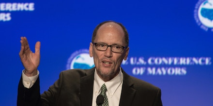 US Labor Secretary Tom Perez speaks at the 84th annual Winter Meeting of The United States Conference of Mayors in Washington, DC, on January 21, 2016. / AFP / Nicholas Kamm        (Photo credit should read NICHOLAS KAMM/AFP/Getty Images)