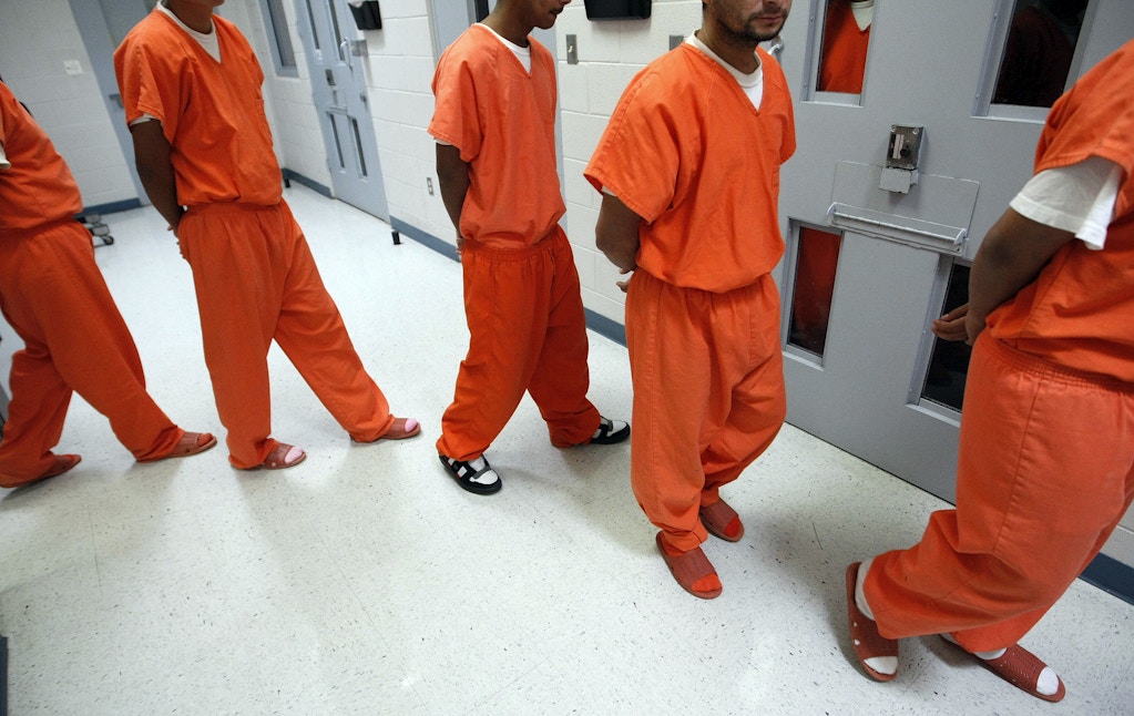 New federal inmates prepare to undergo health screenings while being processed at the Val Verde Correctional Facility in Del Rio, Texas.  (Photo by Tom Pennington/Fort Worth Star-Telegram/MCT via Getty Images)