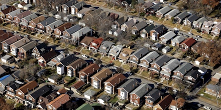Rows of modest houses are seen in Jennings, Mo. in this aerial photo taken Tuesday, Nov. 25, 2014. (AP Photo/Charlie Riedel)