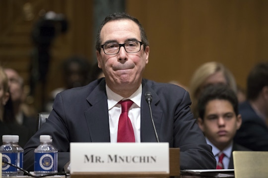 Treasury Secretary-designate Steven Mnuchin listens while testifying on Capitol Hill in Washington, Thursday, Jan. 19, 2017, at his confirmation hearing before the Senate Finance Committee. Mnuchin built his reputation and his fortune as a savvy Wall Street investor but critics charge that he profited from thousands of home foreclosures as the chief of a sub-prime mortgage lender during the housing collapse. (AP Photo/J. Scott Applewhite)