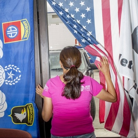 Yolanda Varona, co-director and founder of the Dreamers Moms, looks out the window of the group's headquarters in Tijuana, Mexico on April 9, 2016. Varona was deported and separated from her children in 2014. She founded the group as a way for deported mothers to support each other in the fight to see their children again.