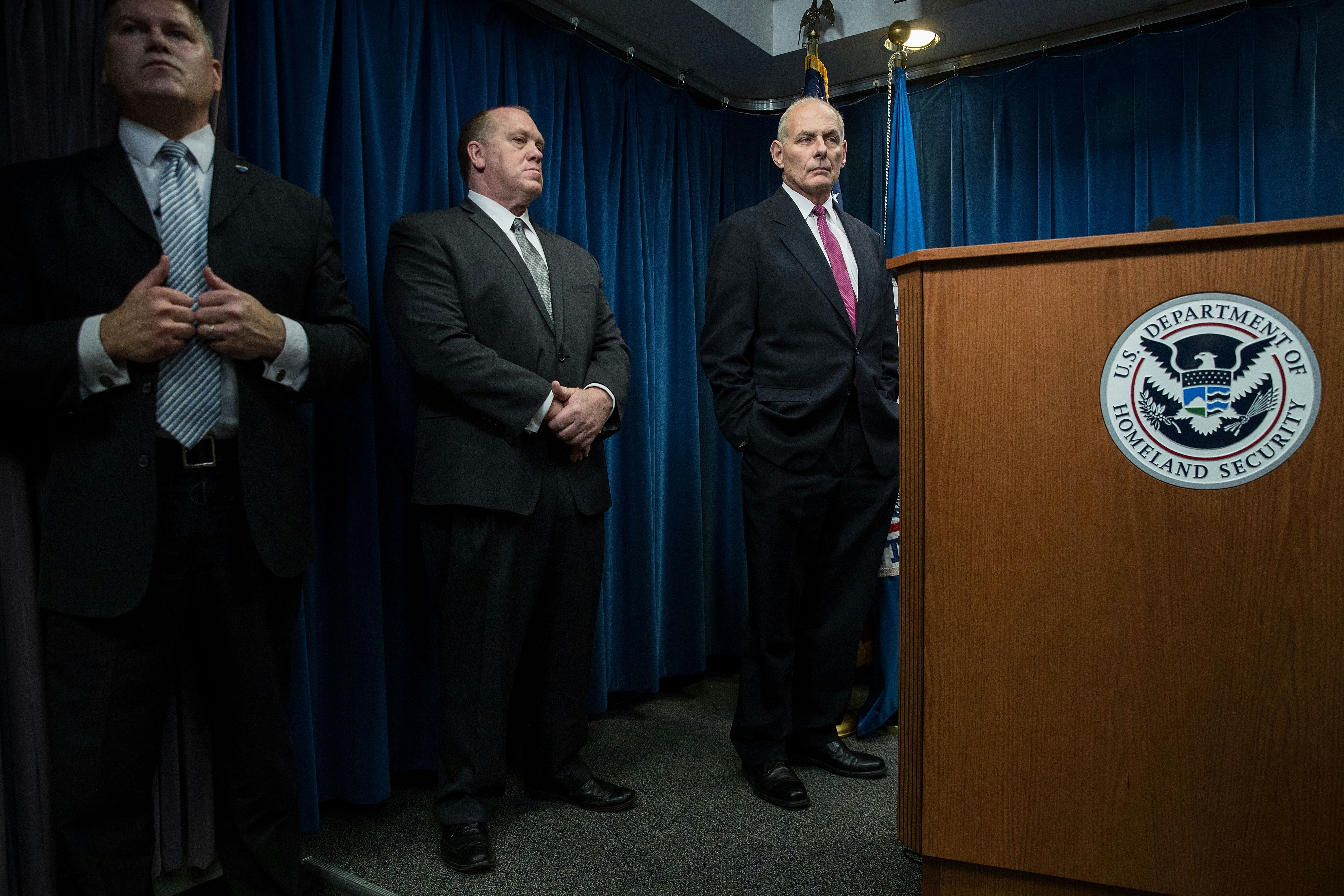 WASHINGTON, DC - JANUARY 31: (L to R) U.S. Immigration and Customs Enforcement (ICE) Acting Director Thomas Homan and Secretary of Homeland Security John Kelly listen to questions during a press conference related to President Donald Trump's recent executive order concerning travel and refugees, January 31, 2017 in Washington, DC. On Monday night, President Donald Trump fired the acting Attorney General Sally Yates after she released a statement saying the Justice Department would not enforce the president's executive order that places a temporary ban on citizens from seven Muslim-majority countries. (Photo by Drew Angerer/Getty Images)