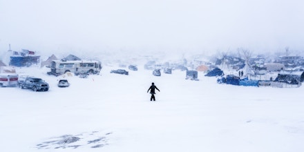 Winter has arrived in Standing Rock at the Oceti Sakowin Camp in North Dakota, the day after the Army Corps of Engineers denied the easement needed to build the pipeline on December 5, 2016. Despite driving snow and 40-plus mile an hour wind a group of 700-plus veterans and water protectors marched toward the barricade on highway 1806. (Photo by Michael Nigro / Pacific Press) *** Please Use Credit from Credit Field ***(Sipa via AP Images)