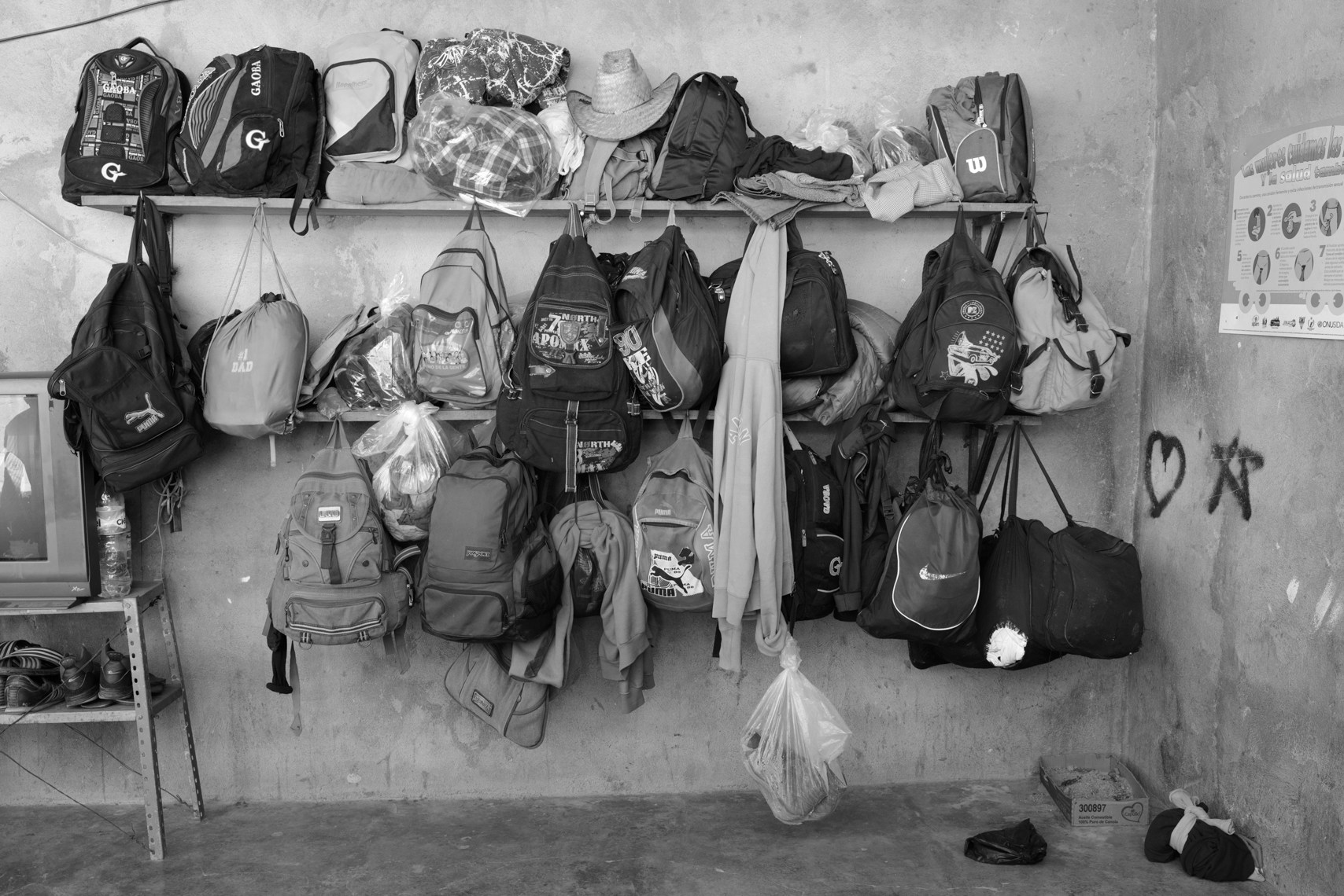 Backpacks hold migrants' possessions at a shelter for migrants in Chahuites, Oaxaca.