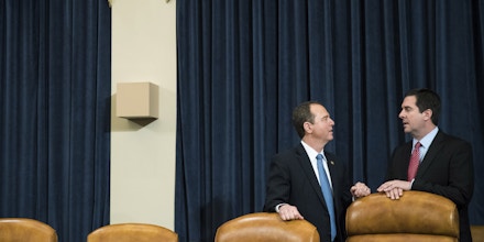 WASHINGTON, DC - MARCH 20: (L to R) Ranking member Rep. Adam Schiff (D-CA) and chairman Rep. Devin Nunes (R-CA) talk with each other during a break during a House Permanent Select Committee on Intelligence hearing concerning Russian meddling in the 2016 United States election, on Capitol Hill, March 20, 2017 in Washington. While both the Senate and House Intelligence committees have received private intelligence briefings in recent months, Monday's hearing is the first public hearing on alleged Russian attempts to interfere in the 2016 election. (Photo by Drew Angerer/Getty Images)