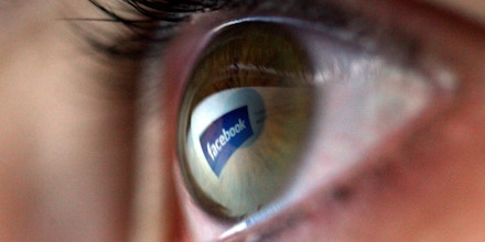LONDON - FEBRUARY 03:  The Facebook logo is reflected in the eye of a girl surfing the internet on February 3, 2008 in London, England.  (Photo by Chris Jackson/Getty Images)